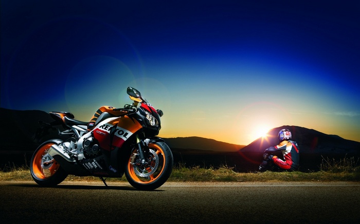 Repsol Honda CBR 1000 RR motorcycle at sunset