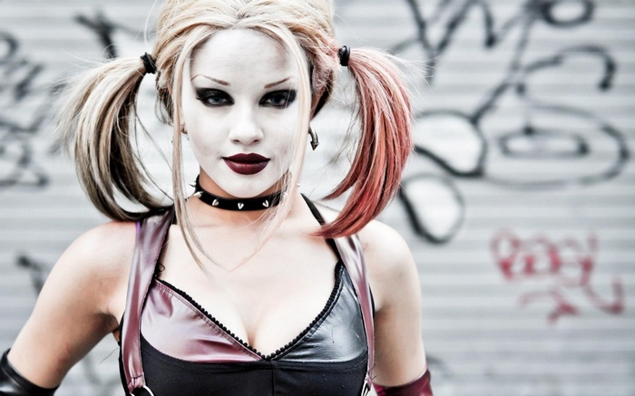Harley Quinn cosplay with blonde and red pigtails