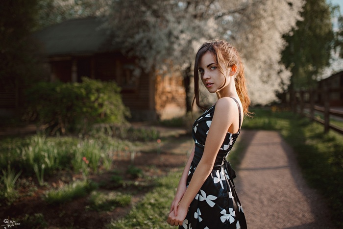 Model in a floral dress by Georgy Chernyadyev