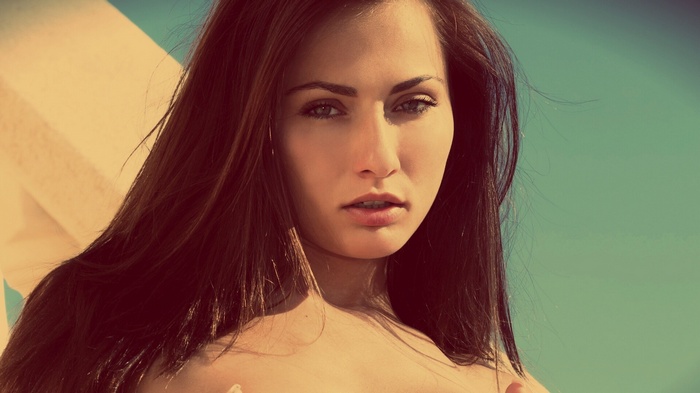 Michaela Isizzu with striking blue eyes