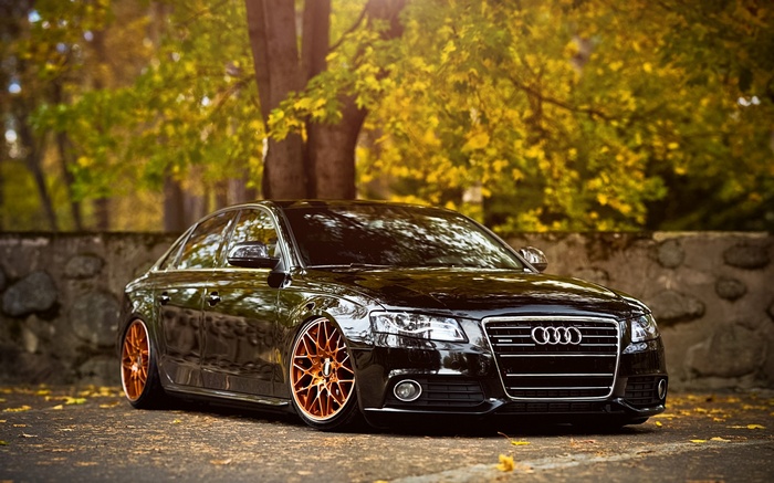 Black Audi A4 with custom wheels