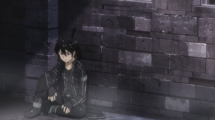 Kirigaya Kazuto sitting by a brick wall