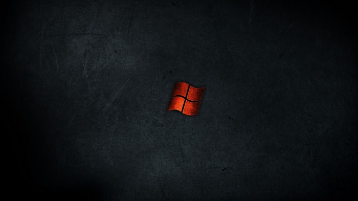 Microsoft Windows logo on a dark textured surface