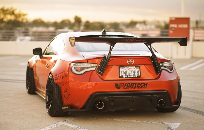 Orange Scion FR-S Rocket Bunny with large rear wing