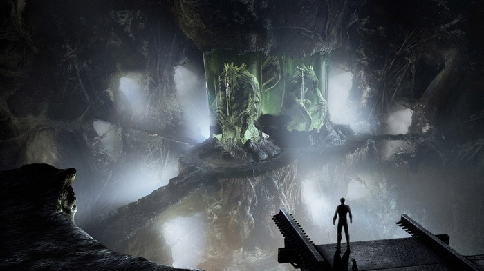 Alien eggs in a dark cave with a man