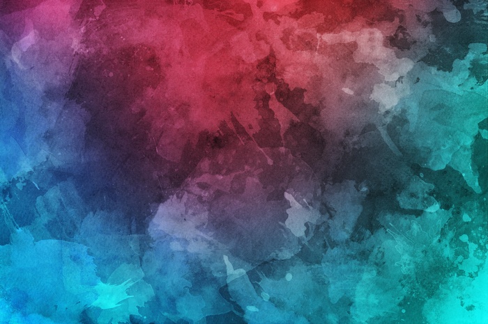 Abstract watercolor texture with red, blue, and green hues