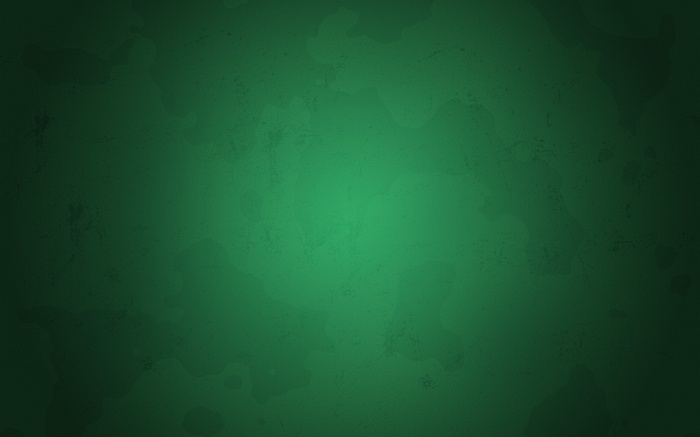 Green textured surface with subtle light and shadow