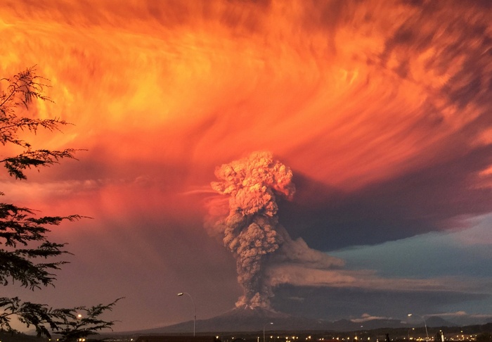 Volcano eruption with fiery clouds