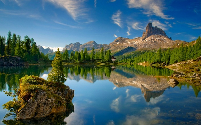 Lake and mountains reflection in the Dolomites