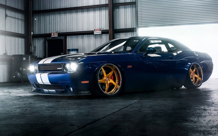 Blue Dodge Challenger SRT with white stripes
