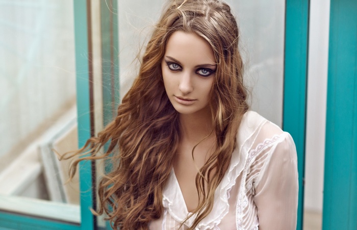 Woman with blue eyes and blonde hair