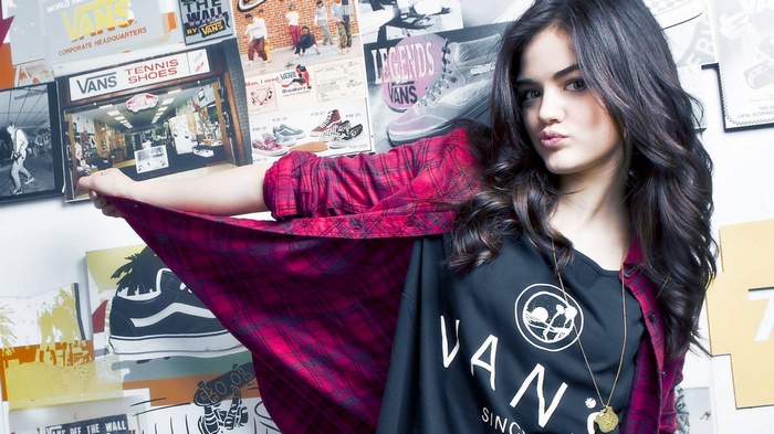 Lucy Hale in front of Vans advertisements