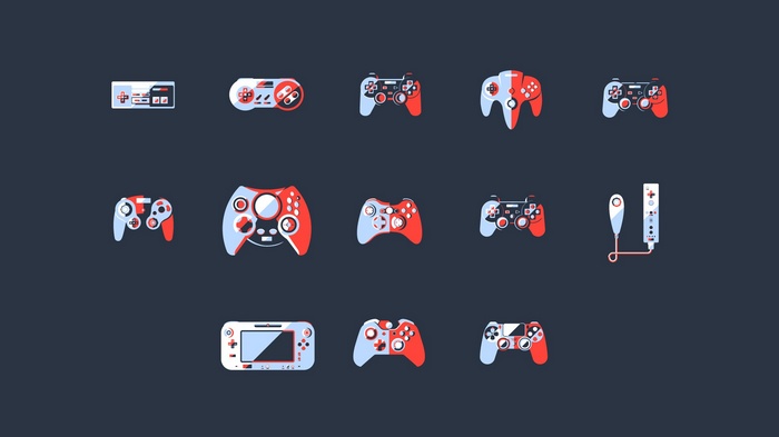 Collection of video game controllers on a dark background