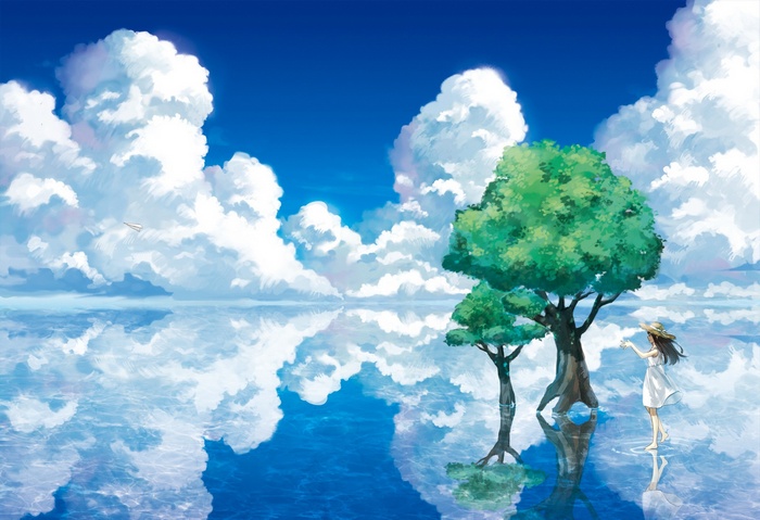 Girl in white dress by trees reflected in water
