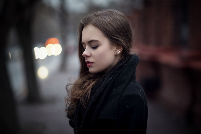 Ekaterina Kuznetsova in a black coat