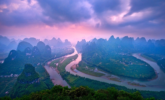 Karst mountains and Li River in China at sunset