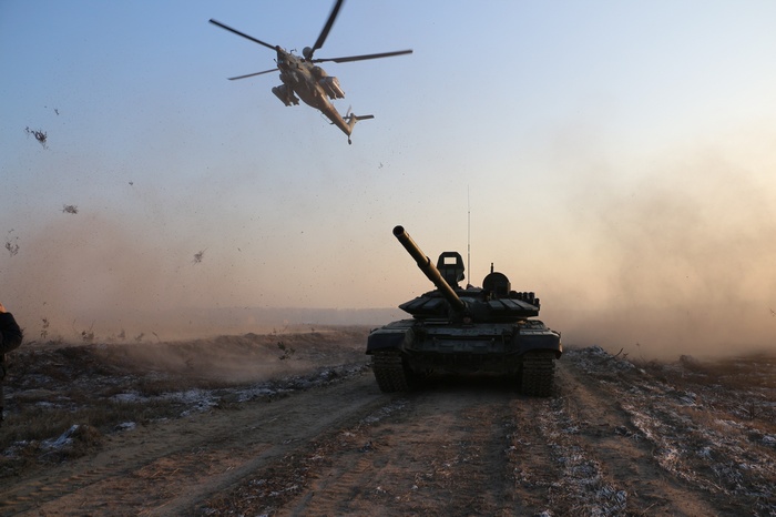 Mil Mi-28 helicopter and T-90 tank in action