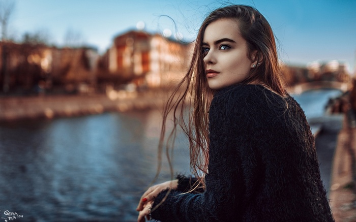 Ekaterina Kuznetsova with long auburn hair outdoors