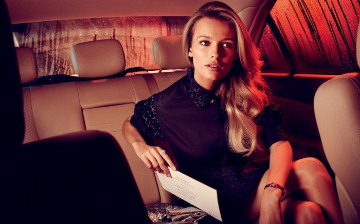Edita Vilkeviciute in a car