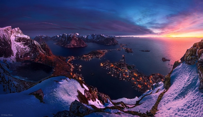 Winter landscape of a Norwegian island village at sunset
