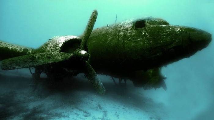 Underwater airplane wreck with propeller