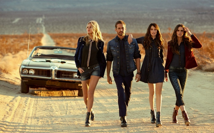 Paul Walker and women with a classic car
