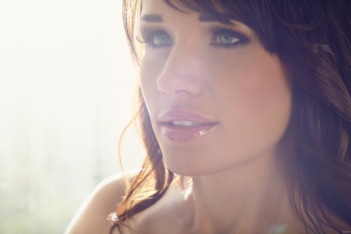 Playboy model with brunette hair and gray eyes