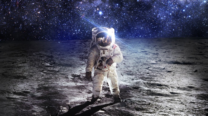 Astronaut on the moon with stars in the background