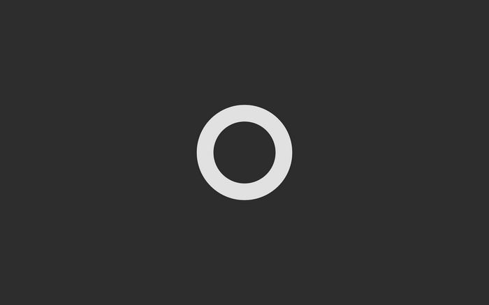 Minimalist white circle on a dark background