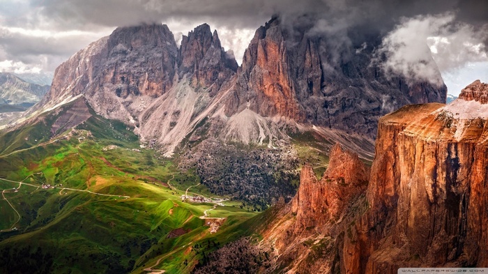 Mountain landscape with green valleys and rocky peaks