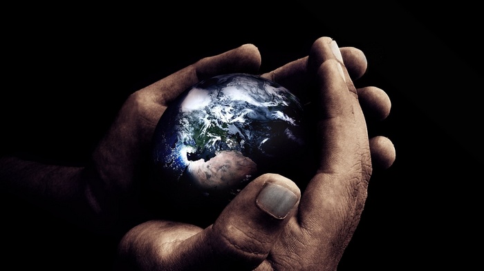 Hands holding the Earth