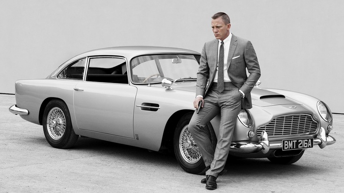 Daniel Craig as James Bond with Aston Martin DB5