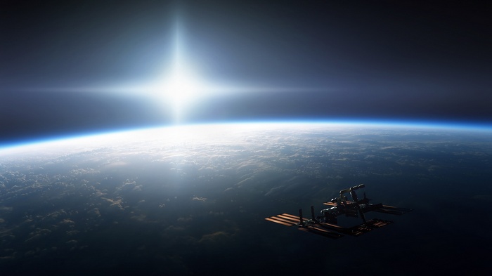International Space Station orbiting Earth with the Sun