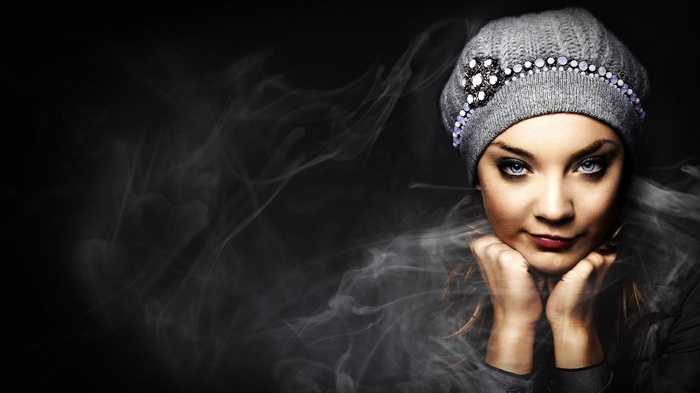 Natalie Dormer with blue eyes and a knitted hat