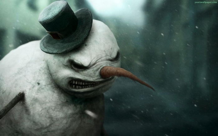 Creepy snowman with a top hat in the snow