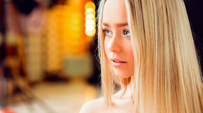 Portrait of a young woman with platinum blonde hair by Sergey Yakubitskiy
