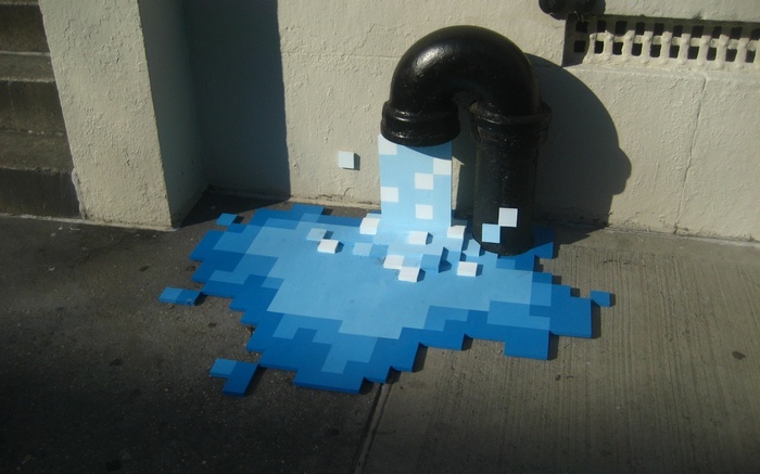 Pixelated water art from a pipe on a street