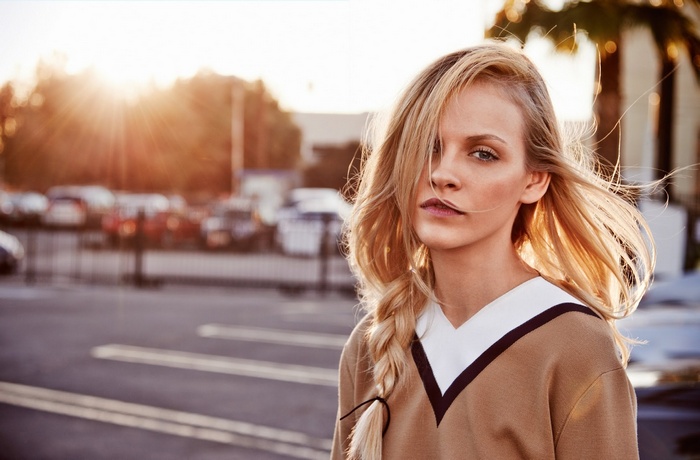 Ginta Lapina with blonde hair in a braid