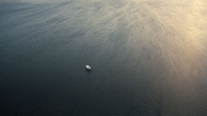 Interstellar movie film still of a boat on water