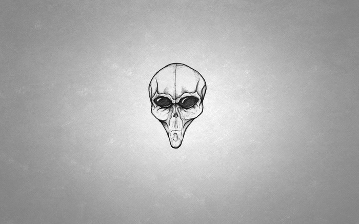 Monochrome drawing of an alien skull on a gradient background