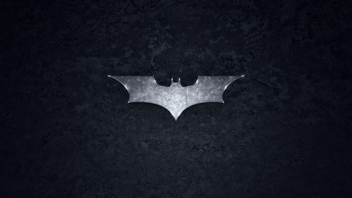 The Batman Logo on a Dark Textured Surface
