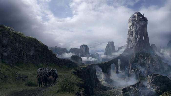 The Eyrie castle in Game of Thrones with a group of riders
