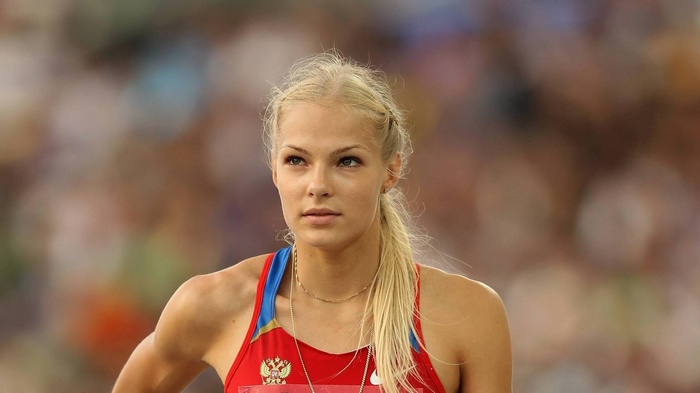 Darya Klishina, Russian athlete, in a red uniform