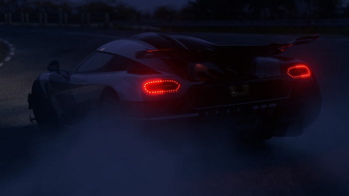 Koenigsegg One:1 sports car drifting at night