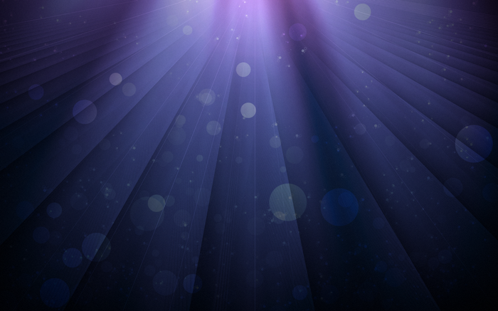 Purple light rays with bokeh and particles