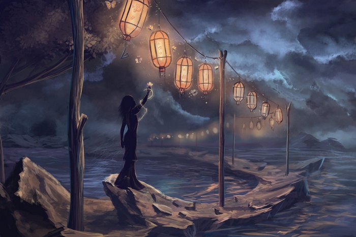 Woman with lanterns on a dark, cloudy night by the sea