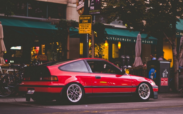 Red Honda CRX parked on a city street
