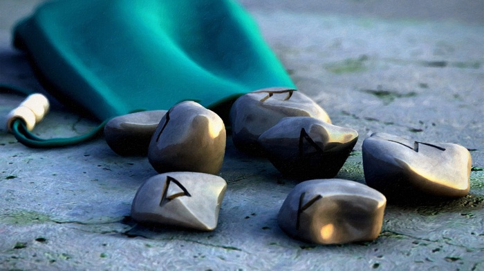 Runes on stones spilling from a teal bag