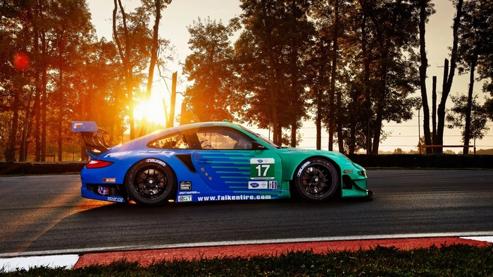 Porsche race car with number 17 on a track