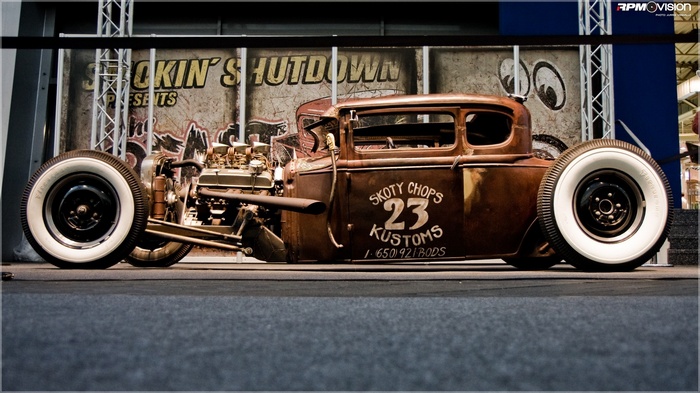 Rusty Hot Rod with "SKOTY CHOPS 23 KUSTOMS" lettering